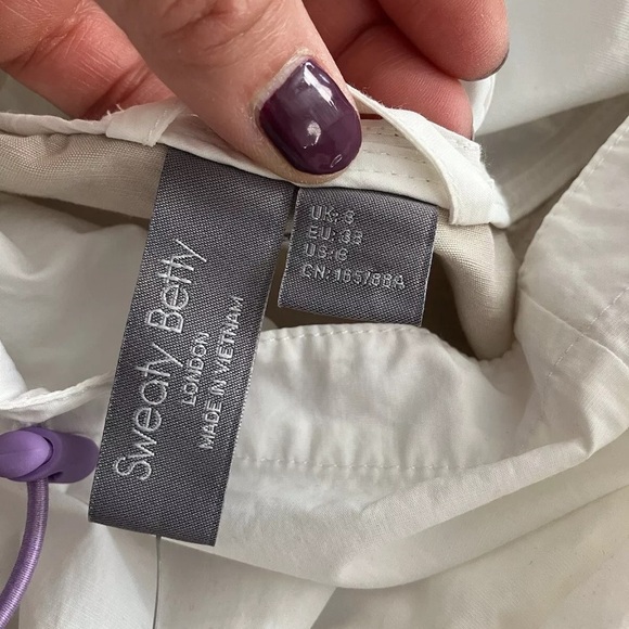 NEW! Sweaty Betty Nomad Color block Hooded Pullover Jacket. White/Tan. Size S - Picture 10 of 10